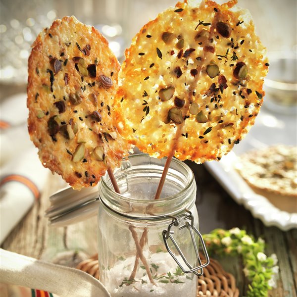 Cheese lollipops with nuts and seeds