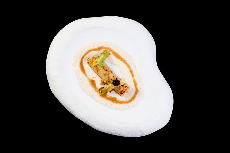 Canelón de pollo de El Prat con calçots de Valls.