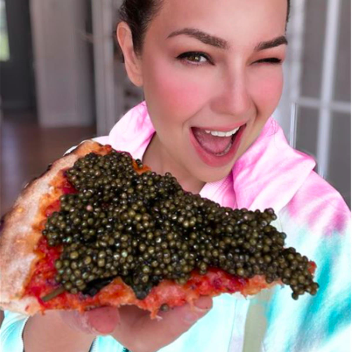 Pizza de caviar de Thalia