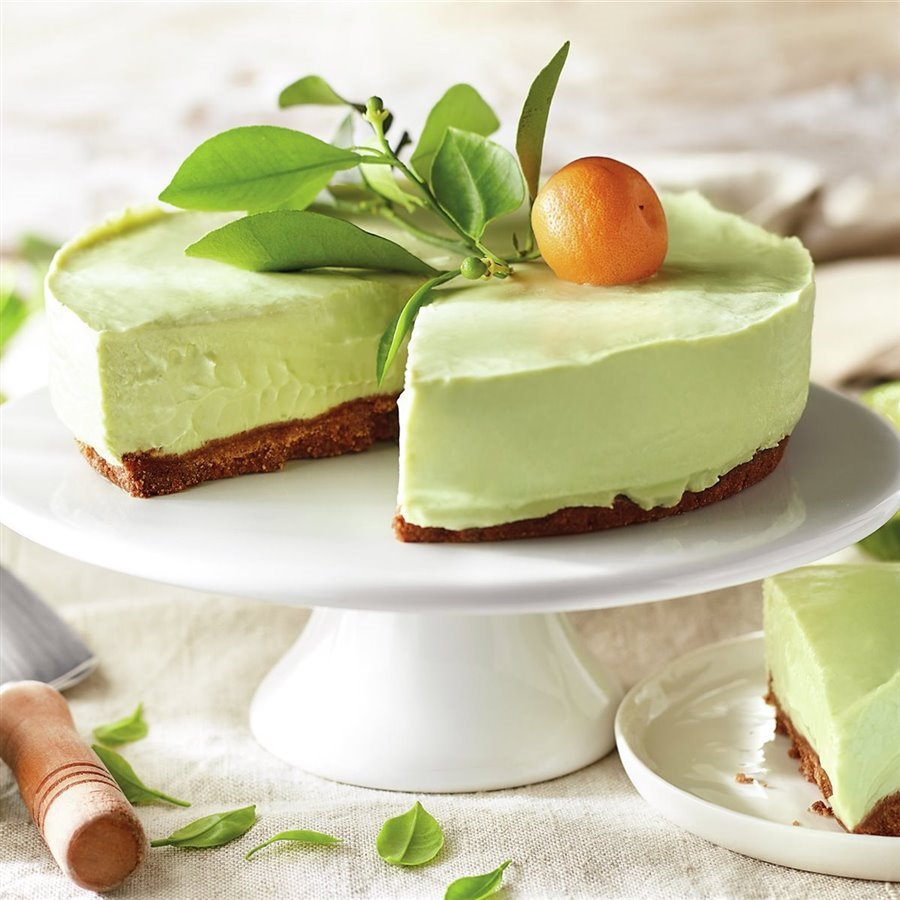 Vegan avocado and lime cheesecake with fruit coulis