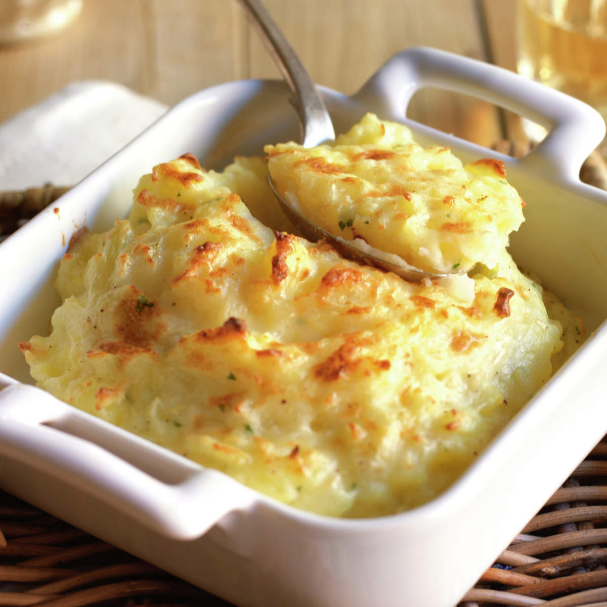 Gratinado de patata y cebolla con queso manchego