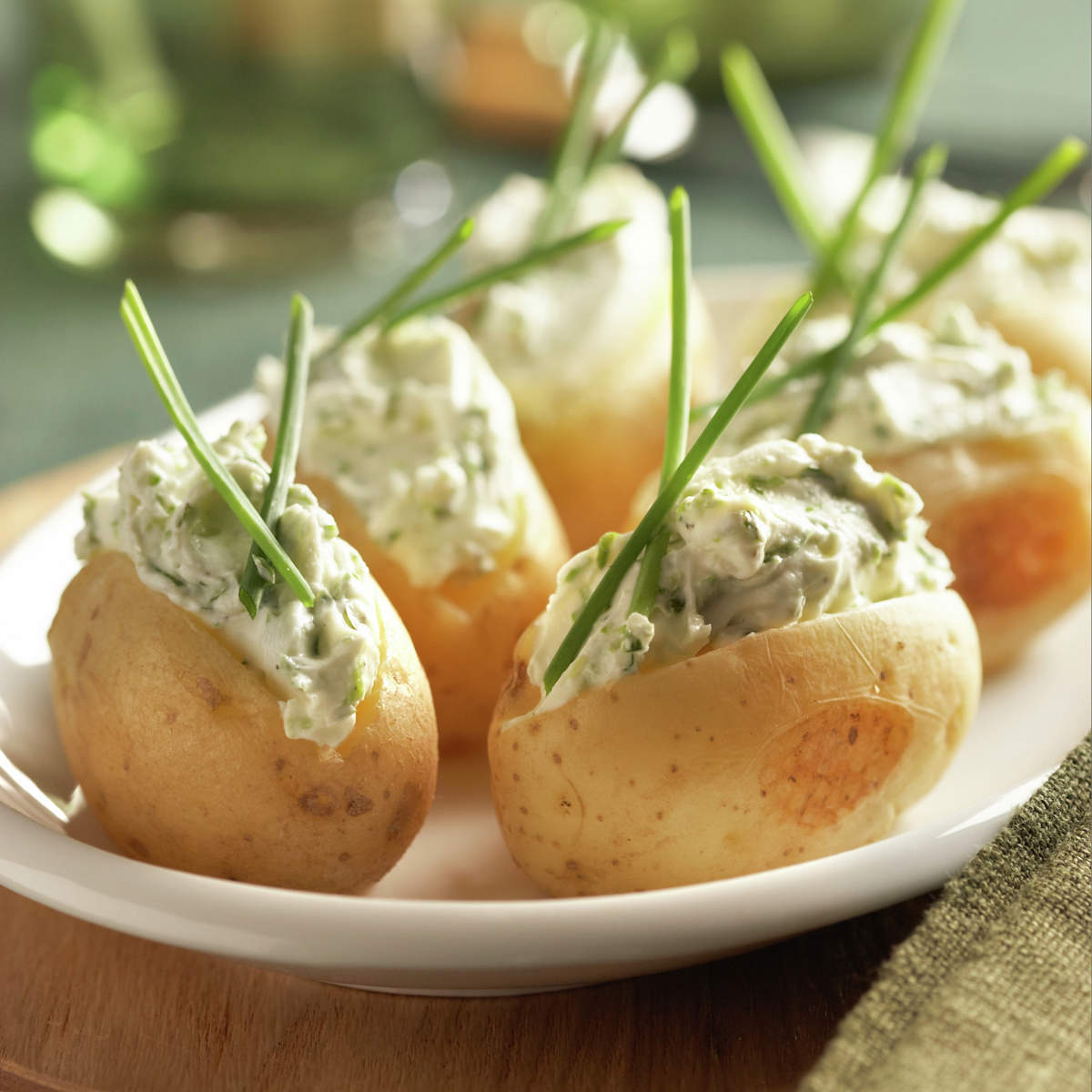 Patatas asadas con crema de queso fresco