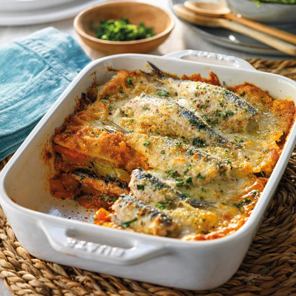 Lasaña de verduras y boquerones gratinada con pan rallado