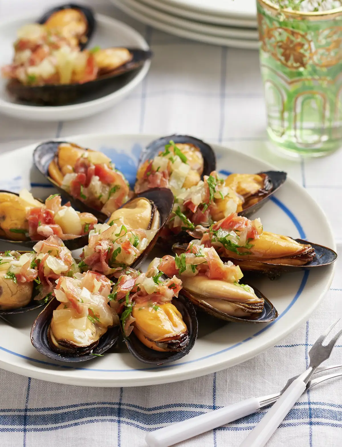 MEJILLONES EN SALSA CON JAMÓN IBÉRICO.