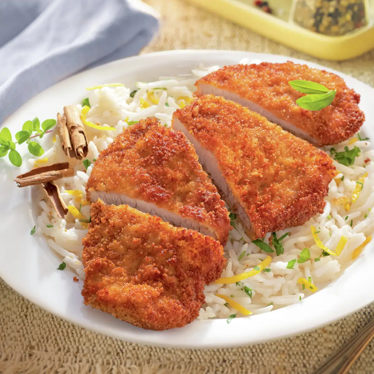 Milanesa de cerdo con arroz