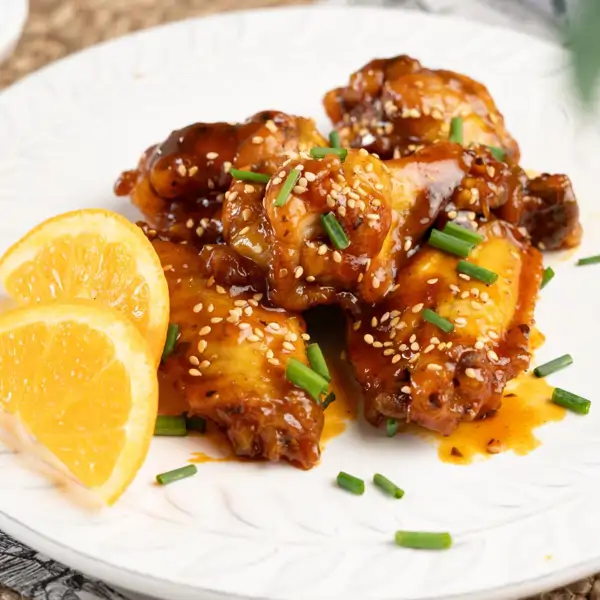 Alitas de pollo en salsa de naranja: sin aceite, facilísimas y con un sabor irresistible