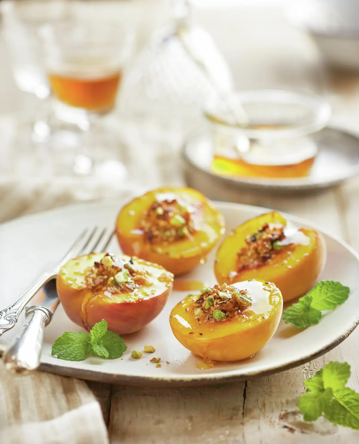 Melocotones gratinados con pistachos